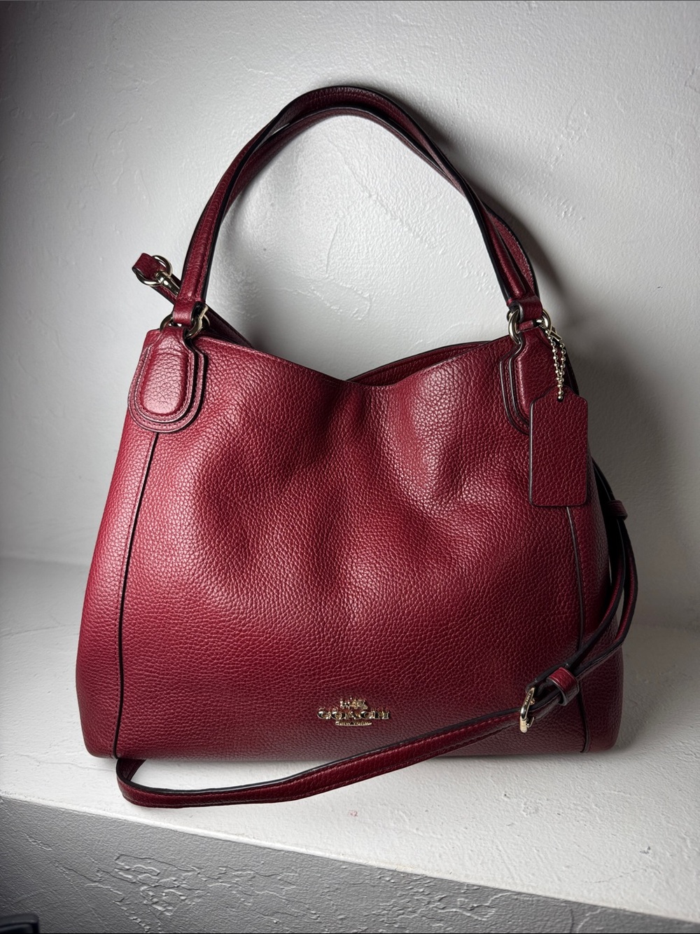 Coach red leather shoulder/crossbody satchel